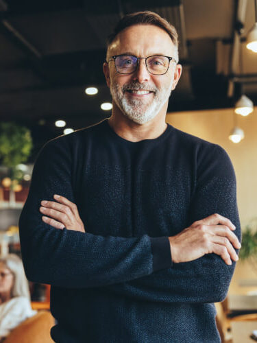 Profesional man standing with arms crossed